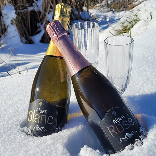 Bottles and glasses of Alpen Rosé and Alpen Blanc – Quality Europe products